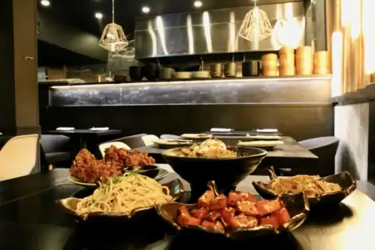 Chinese restaurant in Markham serving noodles, fried chicken, and bold appetizers in a sleek, modern setting.