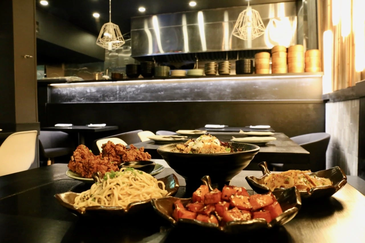 Chinese restaurant in Markham serving noodles, fried chicken, and bold appetizers in a sleek, modern setting.