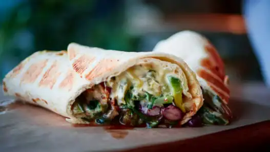 Fresh vegan wrap bursting with flavor from a top Toronto plant-based spot.