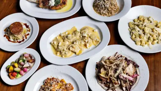 A variety of pasta and meat dishes served at one of the top Italian restaurants in Vancouver.