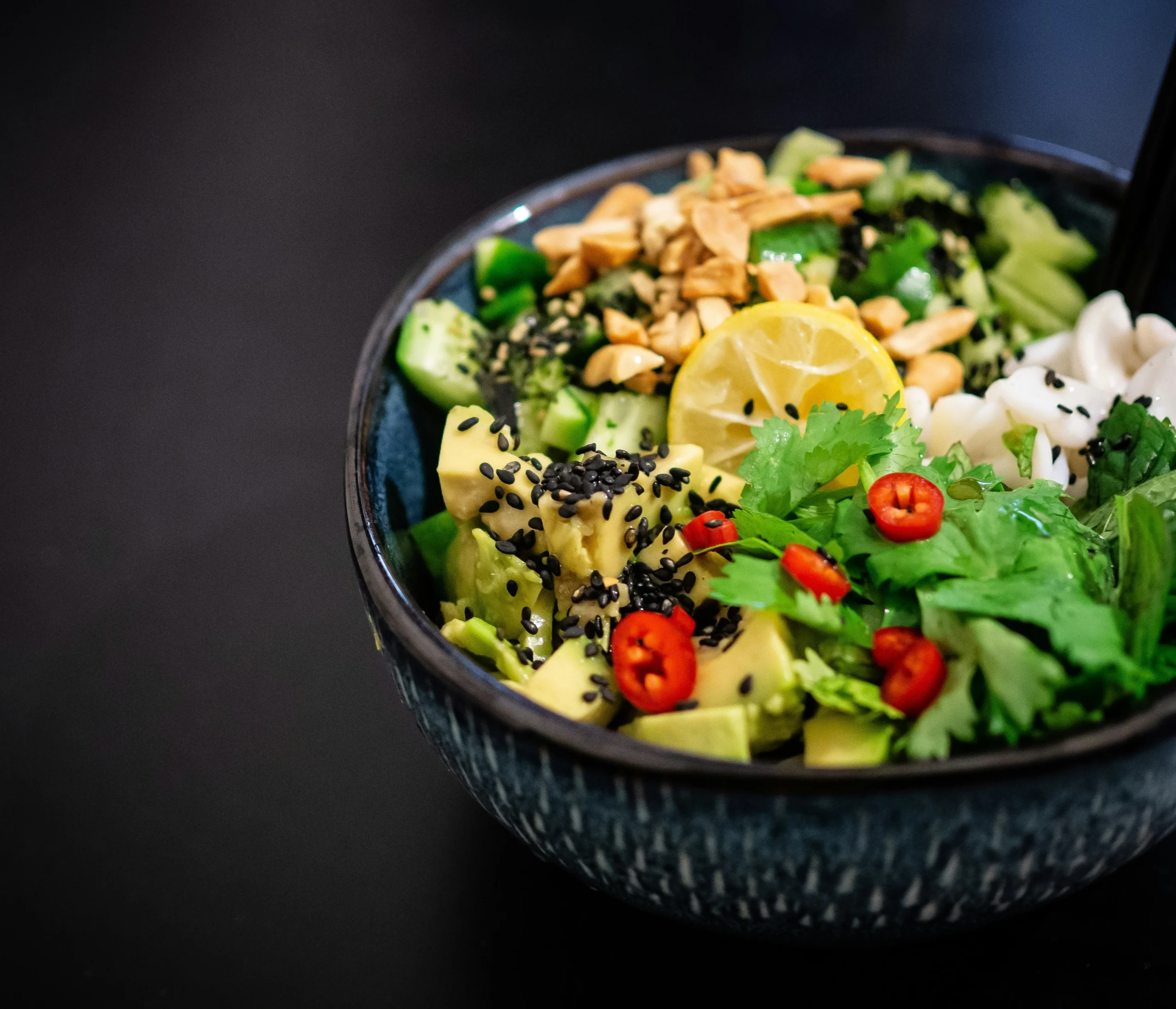 Colorful vegan bowl served at a restaurant in Calgary, featuring fresh vegetables and plant-based toppings.